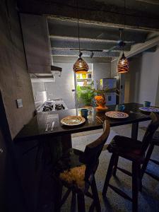 Kuchyň nebo kuchyňský kout v ubytování Urban Hostal Barrancabermeja