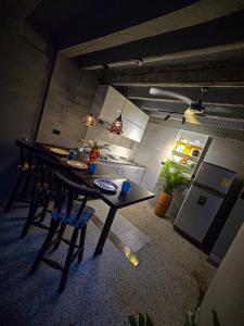 Kuchyň nebo kuchyňský kout v ubytování Urban Hostal Barrancabermeja