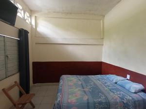 Postel nebo postele na pokoji v ubytování Hospedaje C&R