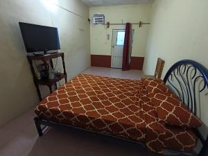 Postel nebo postele na pokoji v ubytování Hospedaje C&R