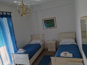 Andreina a San Pietro Apartment客房内的一张或多张床位