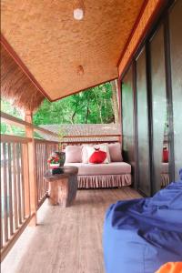 Katil atau katil-katil dalam bilik di Zen Oasis Resort - El Nido