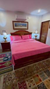 Katil atau katil-katil dalam bilik di Zen Oasis Resort - El Nido