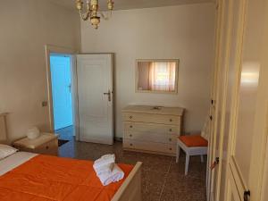 Andreina a San Pietro Apartment客房内的一张或多张床位