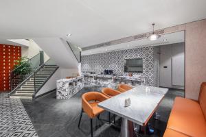 Köök või kööginurk majutusasutuses Liangzhi Huipin Hotel Haikou West Coast Yongwan Road Branch