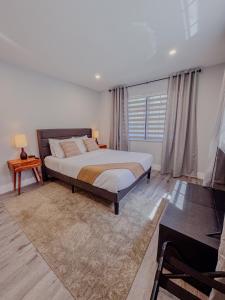 Postel nebo postele na pokoji v ubytování Zoka House 5 mints from Brickell