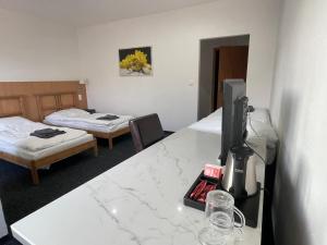 Katil atau katil-katil dalam bilik di Hotel Joker
