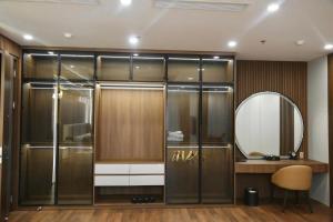a bathroom with a glass shower and a mirror at Queen Hotel Hoàng Gia in Thái Nguyên +65 photos