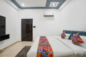 Postel nebo postele na pokoji v ubytování FabHotel The Oak Tree + 25 fotografií