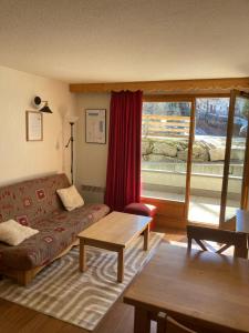 Χώρος καθιστικού στο Bel Appartement lumineux au coeur de la station de Vars