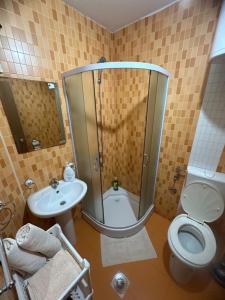 Koupelna v ubytování Apartments Bokan + 30 fotografií