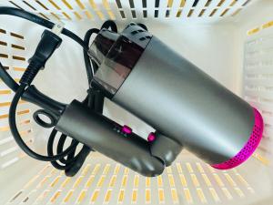 a black microphone sitting on top of a table at 谷町の宿 in Osaka