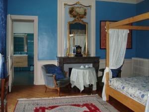 Postel nebo postele na pokoji v ubytování Chateau des poteries