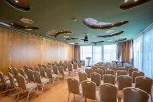 a room with rows of chairs in a conference room at Abba Huesca in Huesca
