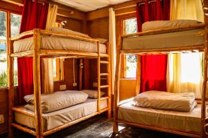 Postel nebo postele na pokoji v ubytování Mudhostel + 10 fotografií