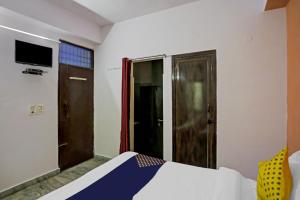 TV o dispositivi per l'intrattenimento presso SPOT ON Raj Hotel Vip Near Worlds Of Wonder
