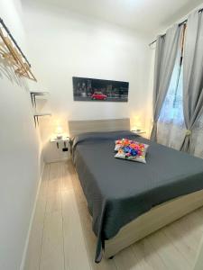 A bed or beds in a room at Casa Sant'Anna