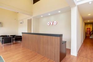 a lobby with aoya sign on the wall at Dancenter Medan City Near Medan Station MDN in Medan