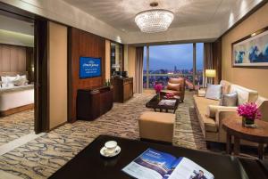 Posezení v ubytování Kangda Howard Johnson Hotel Qingdao
