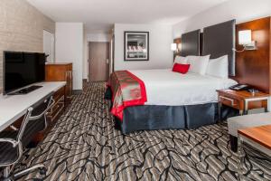 Postel nebo postele na pokoji v ubytování Ramada by Wyndham Austin South