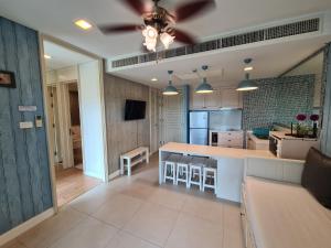 a kitchen with a large island in a room at Marrakesh Residence HuaHin BunkBed Family Room in Hua Hin