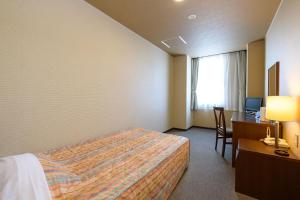 Postel nebo postele na pokoji v ubytování Hotel Asyl Nara Annex + 1 fotografie