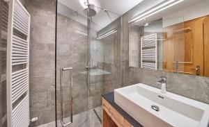 Koupelna v ubytování Delfi Ski & Bike Apartments