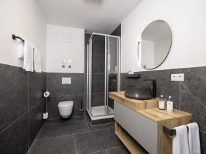 Kopalnica v nastanitvi Modernes Appartement am Wilden Kaiser