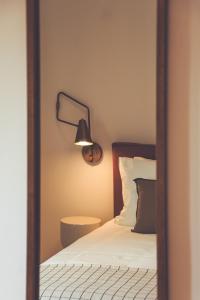 Voodi või voodid majutusasutuse Agriturismo Scala - Eco Boutique B&B toas