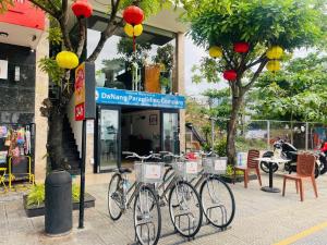 a group of bikes parked in front of a store at Sontra Sea Hotel in Danang