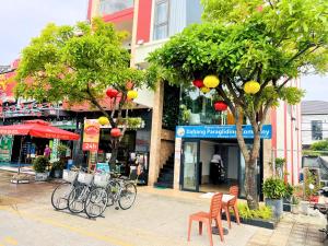 a group of bikes parked in front of a building at Sontra Sea Hotel in Danang