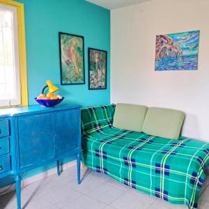 Posezení v ubytování Painter's house by the beach