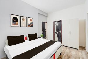 Postel nebo postele na pokoji v ubytování HOTEL BLUEMOON
