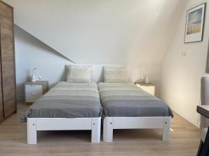 Landhuis Mariëtta客房内的一张或多张床位