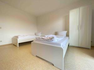 Postel nebo postele na pokoji v ubytování STA1043 gut geschnittene Monteurwohnung mit Balkon