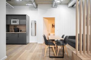 Kuchyň nebo kuchyňský kout v ubytování Homaris Apartments Isartor