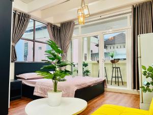 Postel nebo postele na pokoji v ubytování Cali Homestay
