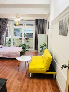 Postel nebo postele na pokoji v ubytování Cali Homestay