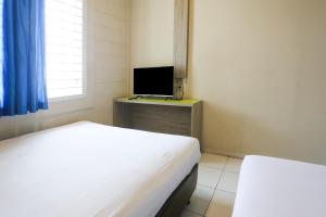 TV a/nebo společenská místnost v ubytování Hotel Villa Bunga Bunga 6 Hour Stay