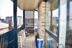 a balcony with a view of a city at Breathtaking Camberwell Skyline Views in London
