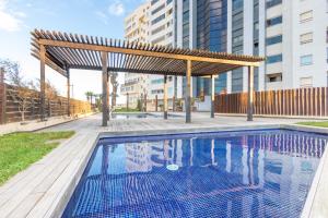 The swimming pool at or close to Apart-rent Apartment Cristall Mar 2º 0058
