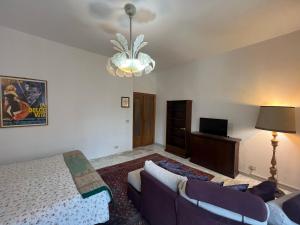 Postel nebo postele na pokoji v ubytování corte degli ulivi in roma