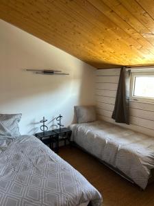 Postel nebo postele na pokoji v ubytování Escale