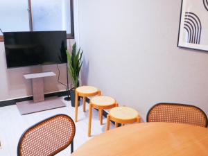 TV a/nebo společenská místnost v ubytování MSTAY東池袋one
