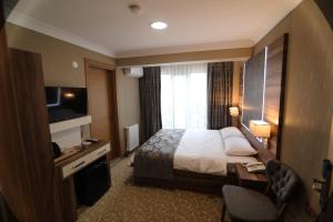 Postel nebo postele na pokoji v ubytování Marbes HOTEL