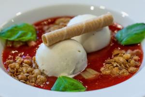 a bowl of food with ice cream and sauce at Myrkdalen Resort Hotel in Myrkdalen