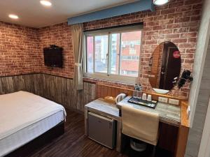 Bin Chen Business Hotelにあるベッド