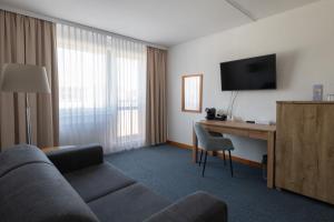 TV a/nebo společenská místnost v ubytování OREA Hotel Voro Brno