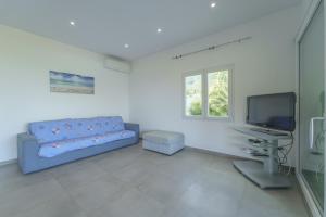 Et tv og/eller underholdning på Villetta Biodola Beach