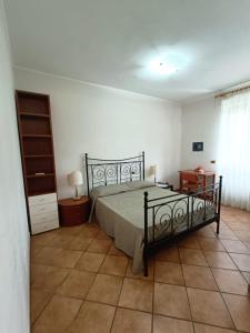 Postel nebo postele na pokoji v ubytování Relais Albalonga
